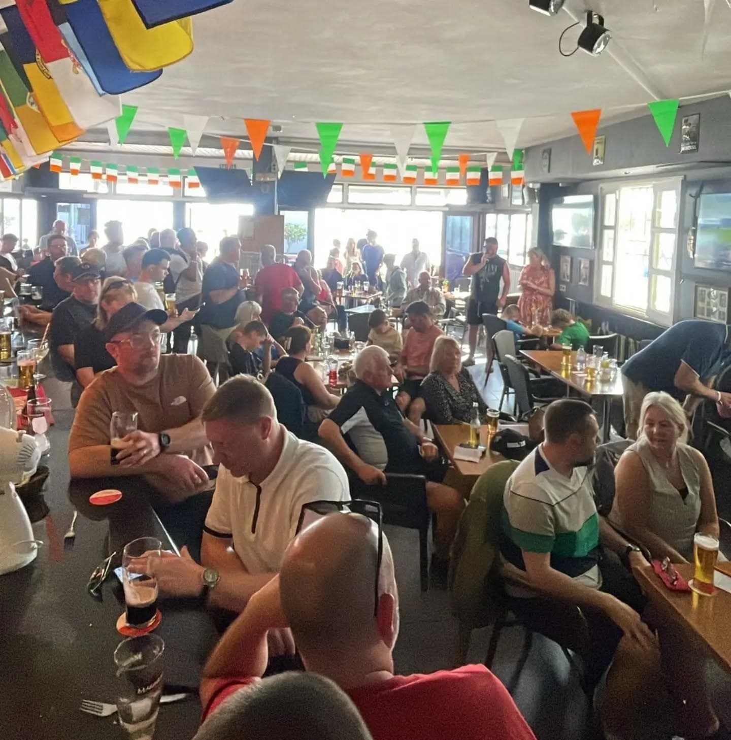 A match-day crowd watching GAA at O'Connor's, Playa Blanca